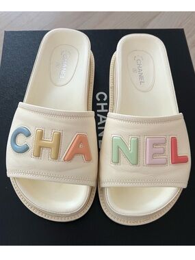 CHANEL Cream Leather Slide Sandals with Pastel Multicolor Logo